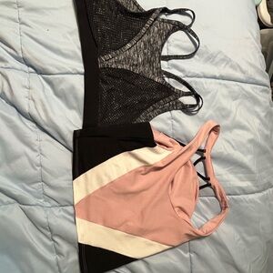 Two sports bras from Pink and VS Sport